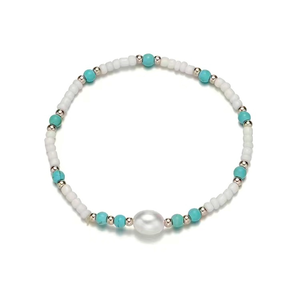 Beautiful beaded bracelet with real pearl centerpiece.